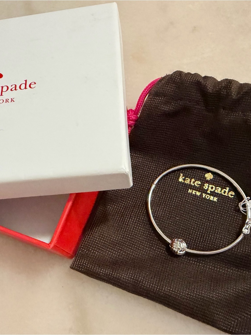 kate spade silver-tone knot bangle bracelet - Picture 1 of 4